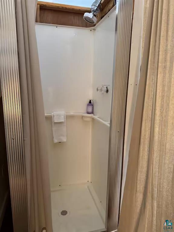 5607 Skogvei Rd, Duluth, MN 55803 - full bath featuring a shower stall