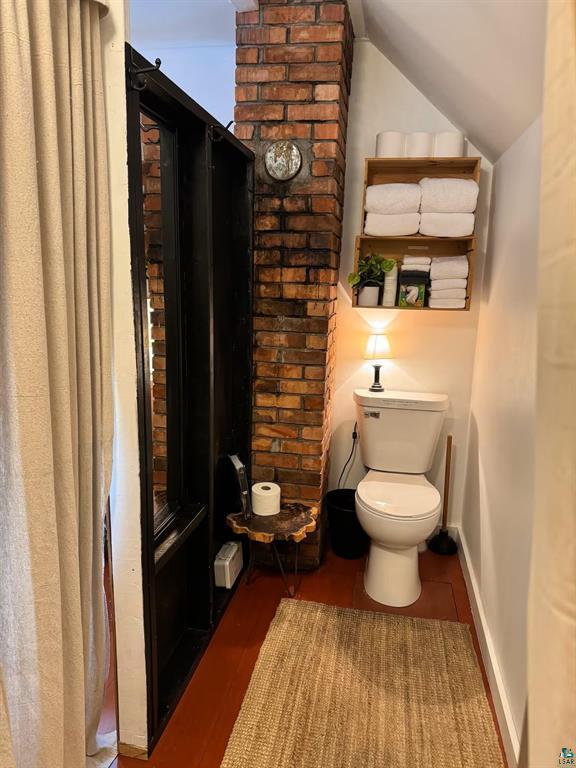5607 Skogvei Rd, Duluth, MN 55803 - bathroom with toilet and lofted ceiling