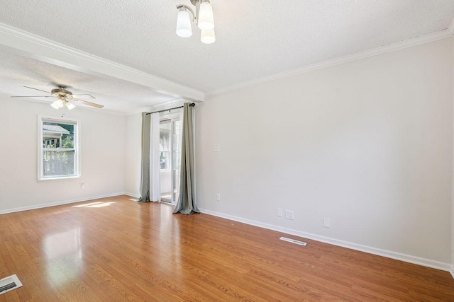 178 Mainzer St, West Saint Paul, MN 55118 - spare room featuring a textured ceiling, a ceiling fan, light wood-type flooring, and crown molding