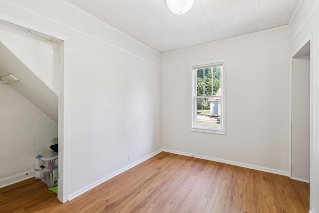 178 Mainzer St, West Saint Paul, MN 55118 - empty room featuring light wood-type flooring and ornamental molding