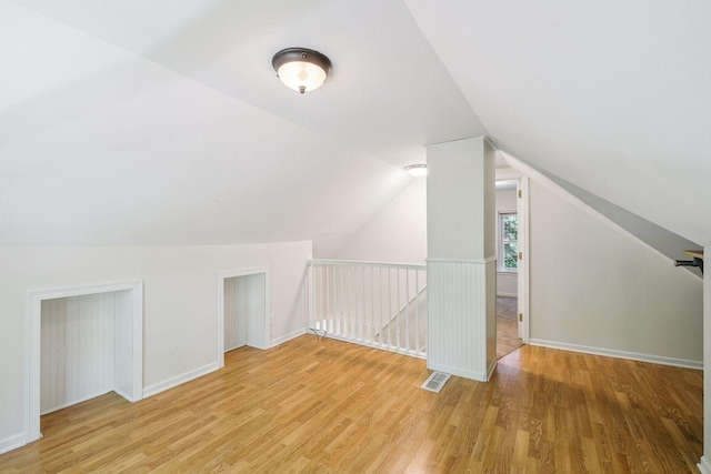 178 Mainzer St, West Saint Paul, MN 55118 - additional living space featuring wood finished floors and vaulted ceiling