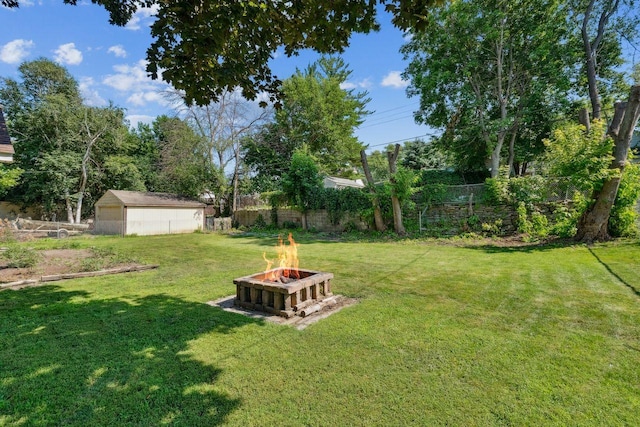 178 Mainzer St, West Saint Paul, MN 55118 - view of yard featuring a fire pit and an outbuilding