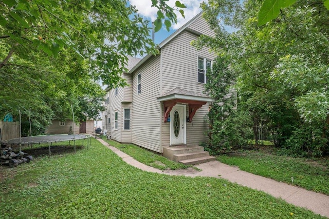 4111 Bryant Ave N, Minneapolis, MN 55412 - view of front of property featuring a trampoline