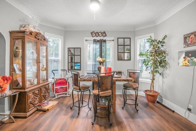 4111 Bryant Ave N, Minneapolis, MN 55412 - dining space with a textured ceiling and wood finished floors