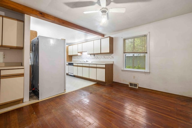 13425 Pillager Dam Rd SW, Sylvan Twp, MN 56473 - kitchen featuring white appliances, hardwood / wood-style flooring, light countertops, a ceiling fan, and beamed ceiling