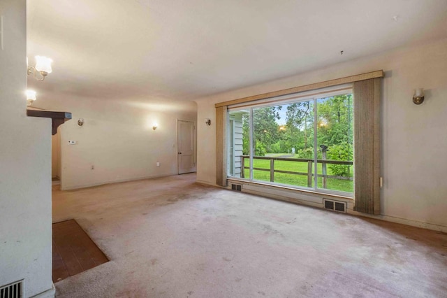 13425 Pillager Dam Rd SW, Sylvan Twp, MN 56473 - unfurnished living room featuring carpet flooring and baseboards