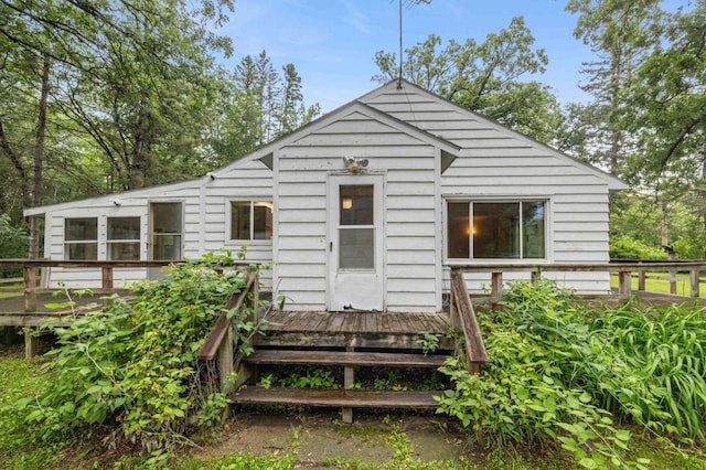 13425 Pillager Dam Rd SW, Sylvan Twp, MN 56473 - rear view of property with a wooden deck