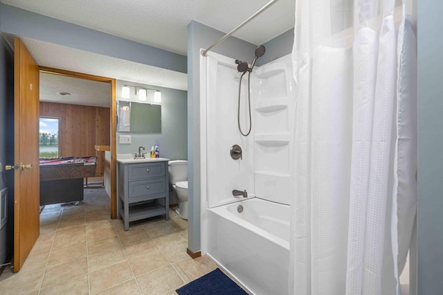 51800 500th St, Menahga, MN 56464 - full bathroom featuring shower / bath combo, vanity, wooden walls, and a textured ceiling
