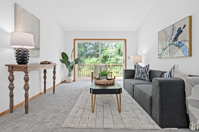 8811 Coffman Path, Inver Grove Heights, MN 55076 - carpeted living room featuring vaulted ceiling and baseboards
