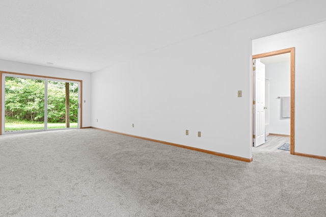 8811 Coffman Path, Inver Grove Heights, MN 55076 - carpeted spare room with baseboards