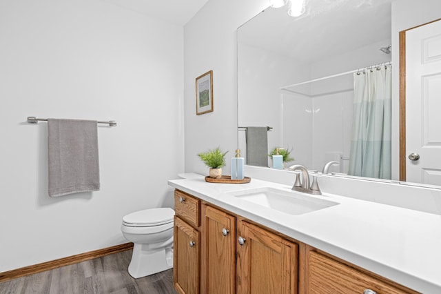 8811 Coffman Path, Inver Grove Heights, MN 55076 - bathroom featuring vanity, wood finished floors, and a shower with curtain