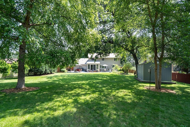 10315 Boundary Creek Ter, Maple Grove, MN 55369 - view of yard with a shed and a patio area