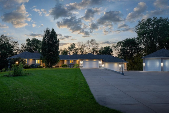 8045 County Road 116, Corcoran, MN 55340 - ranch-style house featuring a lawn, concrete driveway, and a garage