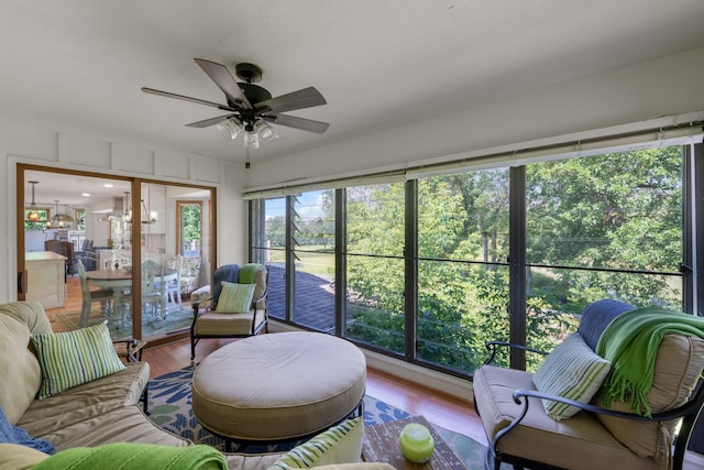 8045 County Road 116, Corcoran, MN 55340 - sunroom / solarium with a ceiling fan