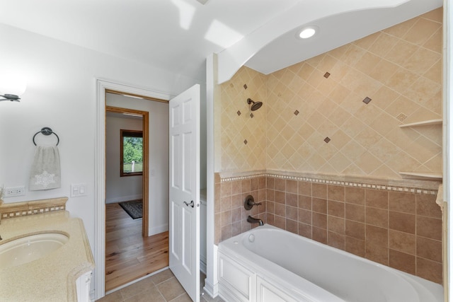 8045 County Road 116, Corcoran, MN 55340 - bathroom with tile patterned floors,  shower combination, vanity, and recessed lighting