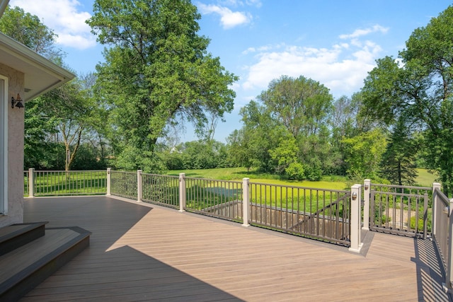 8045 County Road 116, Corcoran, MN 55340 - wooden deck featuring view of scattered trees