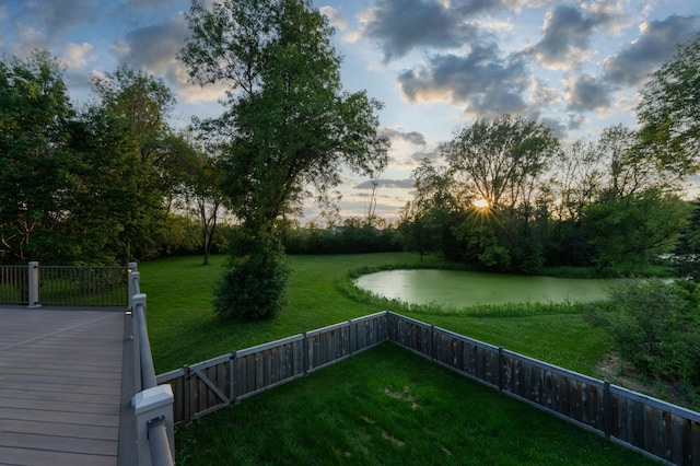 8045 County Road 116, Corcoran, MN 55340 - yard at dusk featuring a water view