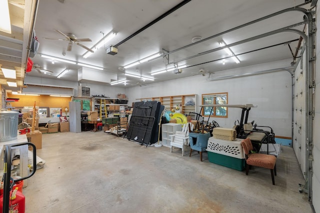 8045 County Road 116, Corcoran, MN 55340 - garage featuring a ceiling fan and a garage door opener