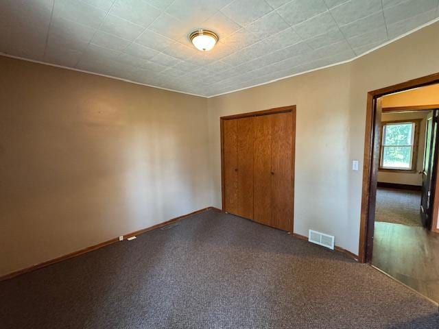 31845 615th Ave, Compton Twp, MN 56482 - unfurnished bedroom featuring baseboards and a closet
