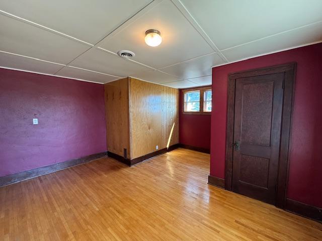 31845 615th Ave, Compton Twp, MN 56482 - unfurnished room with light wood-style floors and a paneled ceiling