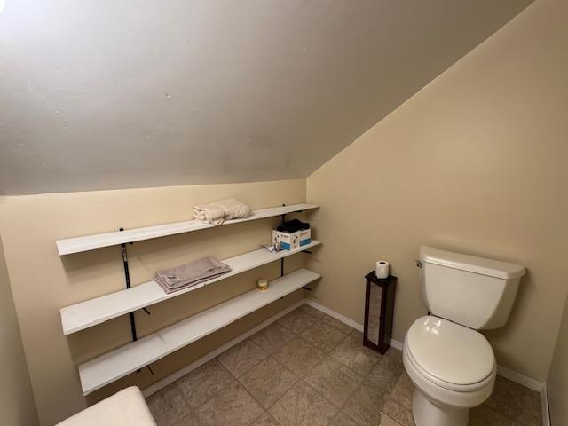 31845 615th Ave, Compton Twp, MN 56482 - bathroom featuring toilet and lofted ceiling