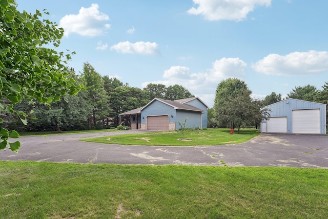 24864 Kettle River Blvd, Wyoming, MN 55025 - view of green lawn featuring an outdoor structure