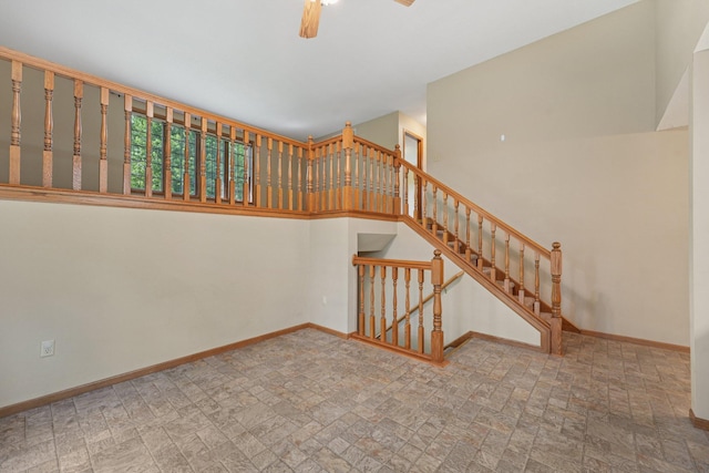 24864 Kettle River Blvd, Wyoming, MN 55025 - stairs with baseboards and a ceiling fan
