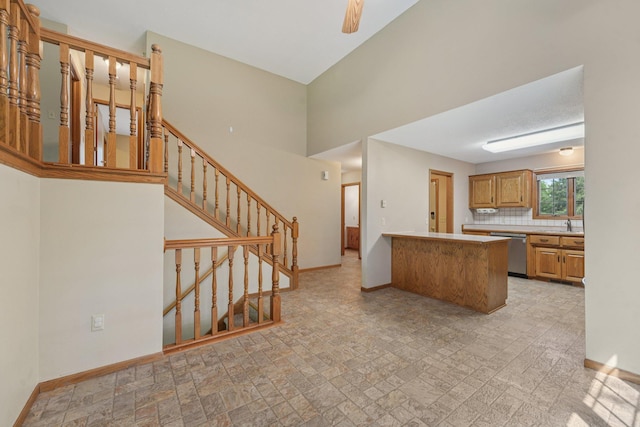 24864 Kettle River Blvd, Wyoming, MN 55025 - kitchen with a peninsula, decorative backsplash, dishwasher, and light countertops