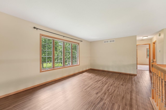 24864 Kettle River Blvd, Wyoming, MN 55025 - empty room featuring wood finished floors and baseboards