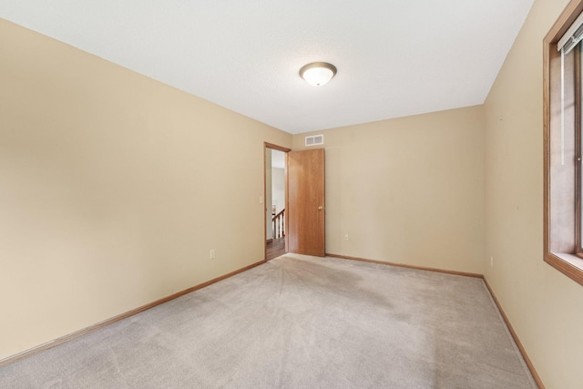 24864 Kettle River Blvd, Wyoming, MN 55025 - unfurnished room with light carpet and baseboards