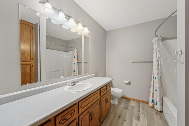 24864 Kettle River Blvd, Wyoming, MN 55025 - full bath featuring wood finished floors, vanity, and shower / bath combination with curtain
