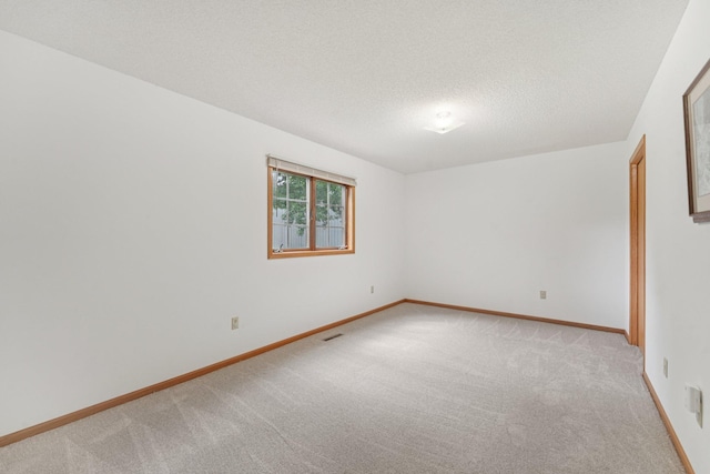24864 Kettle River Blvd, Wyoming, MN 55025 - empty room with light carpet and a textured ceiling