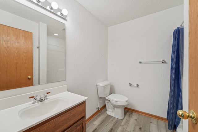 24864 Kettle River Blvd, Wyoming, MN 55025 - full bathroom featuring wood finished floors, vanity, and a shower with curtain