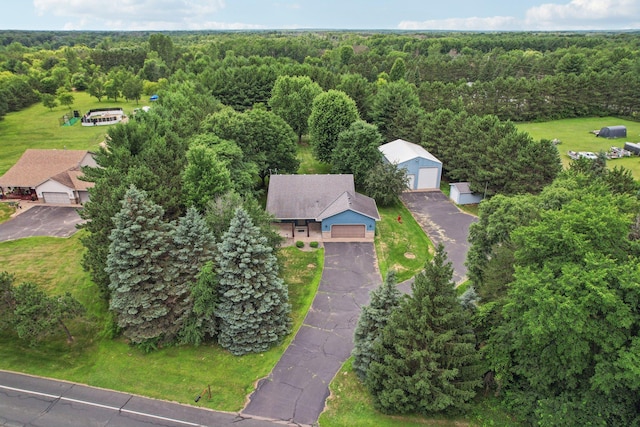 24864 Kettle River Blvd, Wyoming, MN 55025 - aerial view of property and surrounding area with a heavily wooded area