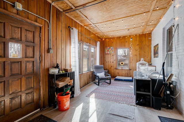 400 8th Ave NE Unit 1, Minneapolis, MN 55413 - sitting room with light wood-style floors and wooden walls