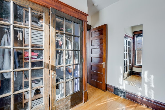 400 8th Ave NE Unit 1, Minneapolis, MN 55413 - entryway featuring hardwood / wood-style floors and french doors