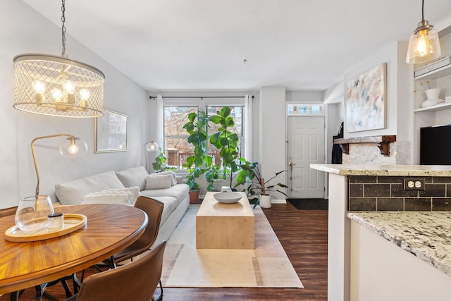 660 2nd St Unit 104, Minneapolis, MN 55401 - living room with dark wood-type flooring and a chandelier