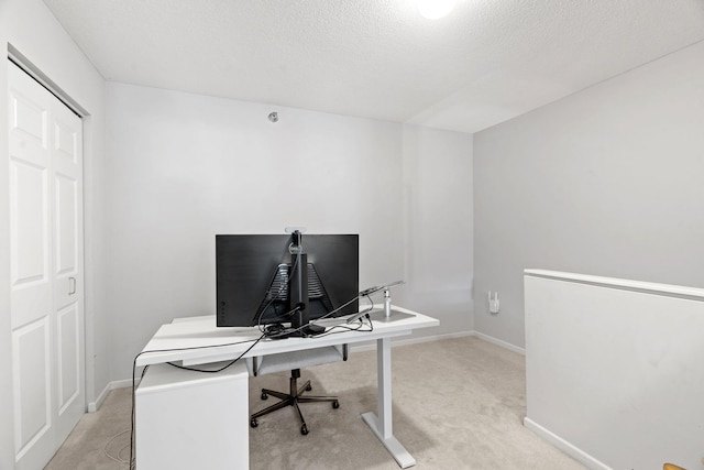 660 2nd St Unit 104, Minneapolis, MN 55401 - carpeted office space featuring baseboards and a textured ceiling