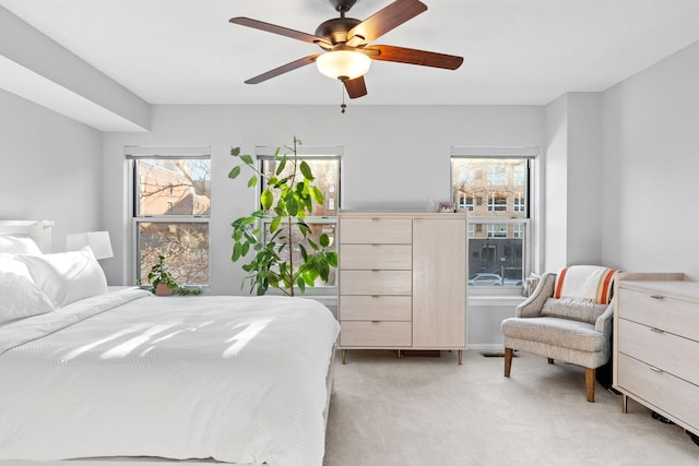 660 2nd St Unit 104, Minneapolis, MN 55401 - bedroom featuring light carpet and ceiling fan