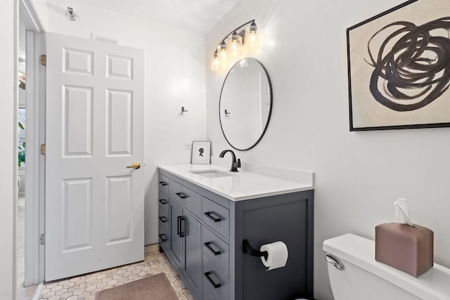 660 2nd St Unit 104, Minneapolis, MN 55401 - bathroom with vanity and tile patterned flooring