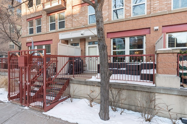 660 2nd St Unit 104, Minneapolis, MN 55401 - snow covered deck with a playground
