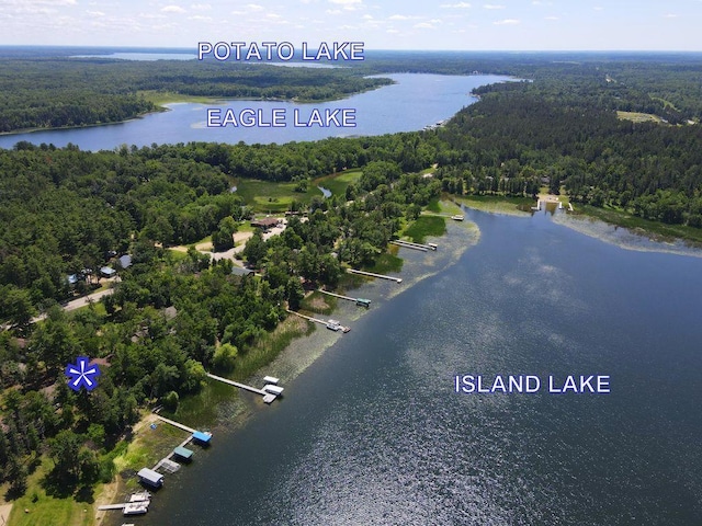 26315 Icon Dr Unit 103, Park Rapids, MN 56470 - drone / aerial view of a heavily wooded area and a nearby body of water