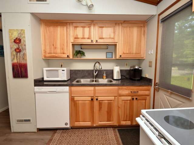 26315 Icon Dr Unit 103, Park Rapids, MN 56470 - kitchen featuring white appliances, dark countertops, light wood-style floors, and open shelves