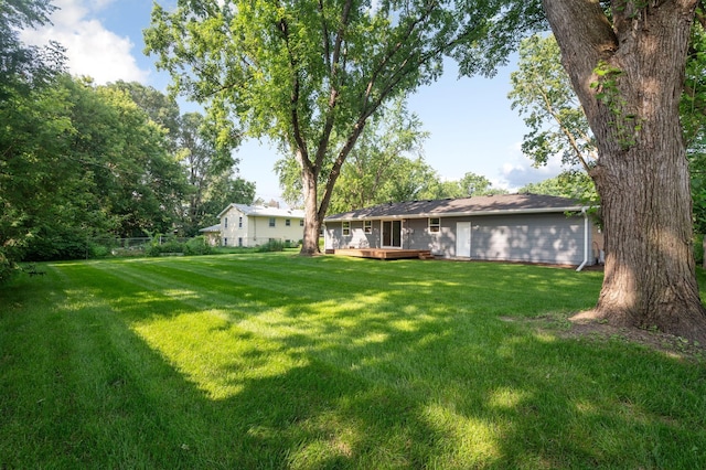 11632 Utah Ave N, Champlin, MN 55316 - view of yard featuring a wooden deck