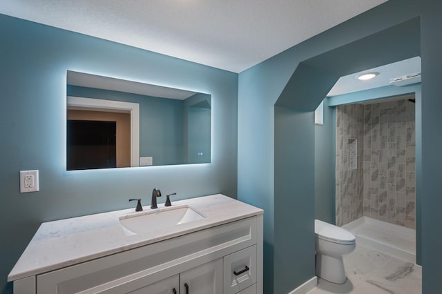 11632 Utah Ave N, Champlin, MN 55316 - bathroom featuring a shower stall, vanity, and marble look tile flooring