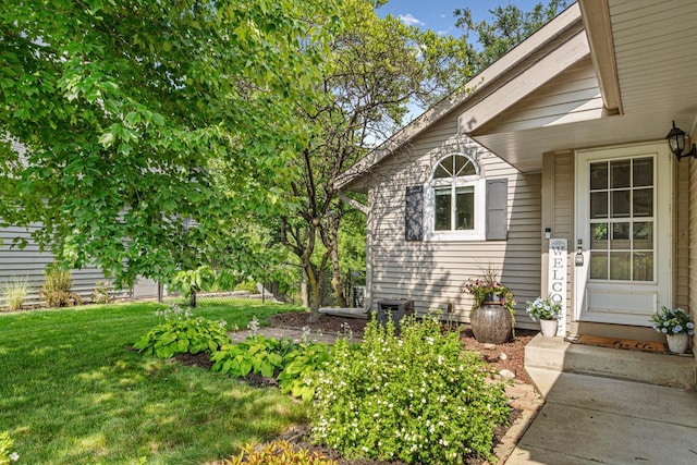14349 Natchez Ave, Savage, MN 55378 - doorway to property with a yard