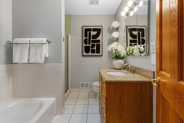 14349 Natchez Ave, Savage, MN 55378 - bathroom with a garden tub, tile patterned floors, vanity, and a stall shower