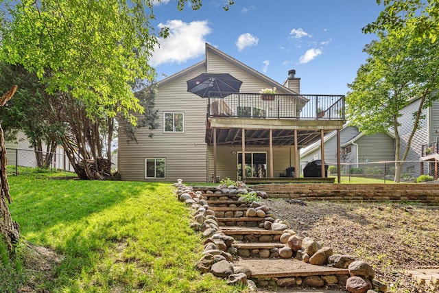 14349 Natchez Ave, Savage, MN 55378 - rear view of house featuring a wooden deck and a chimney