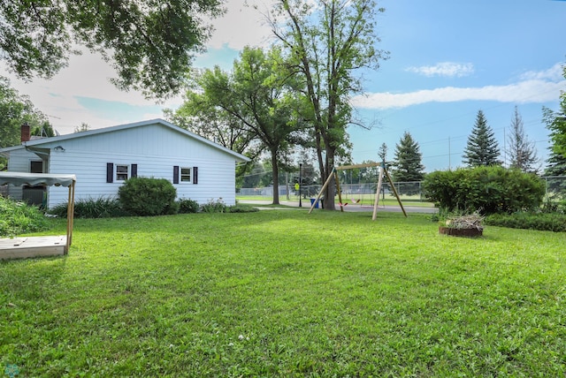 921 16th St S, Fargo, ND 58103 - view of yard with a playground