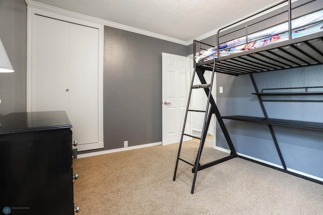 921 16th St S, Fargo, ND 58103 - unfurnished bedroom featuring carpet, ornamental molding, and a textured ceiling